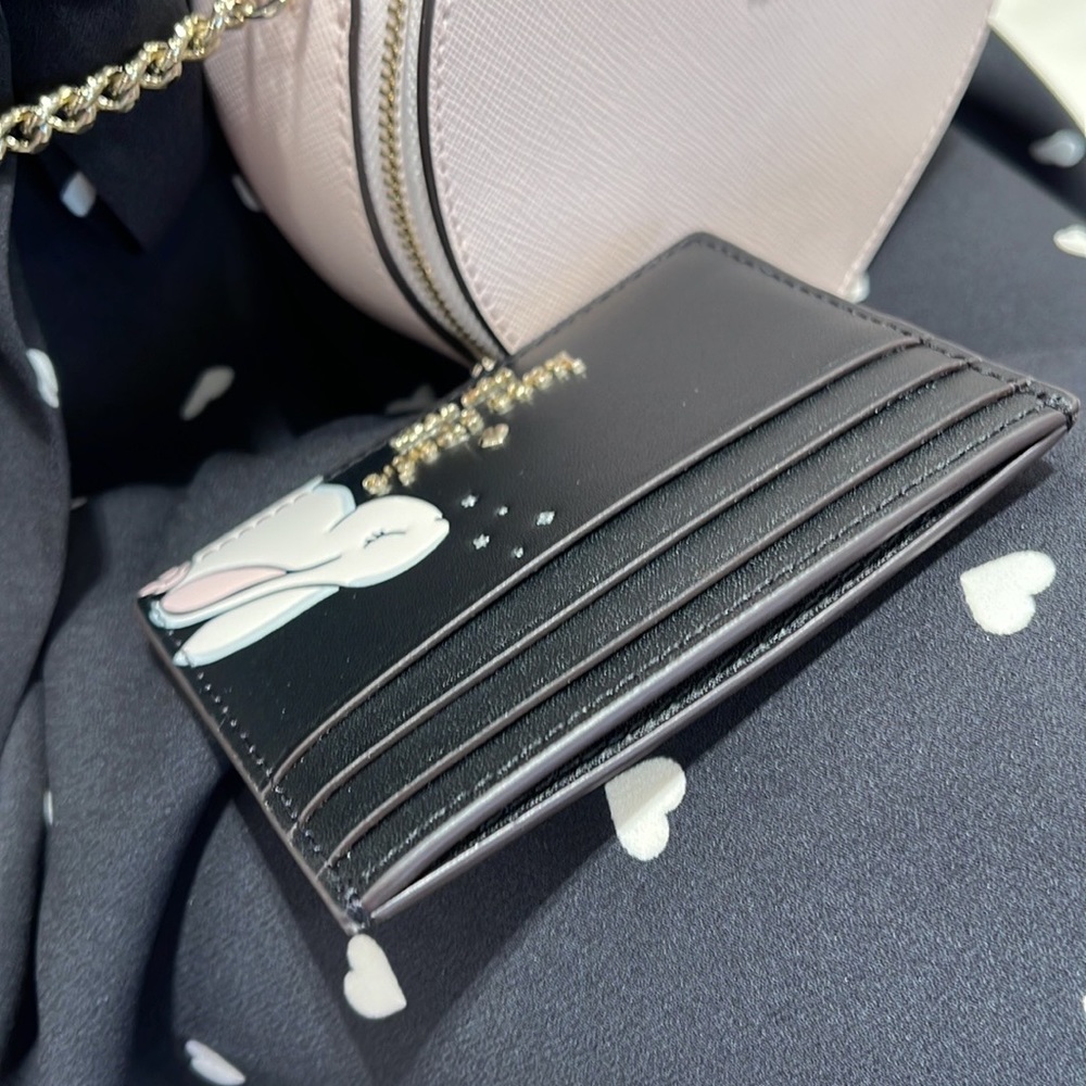 Kate Spade Bunbun Bunny Small Slim Card Holder Wallet

COLOR:
Black Multi
NWT - Picture 10 of 16